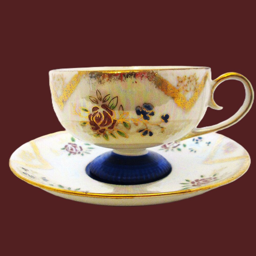 Vintage cobalt blue pedestal lusterware teacup red & blue flowers encased in gol
